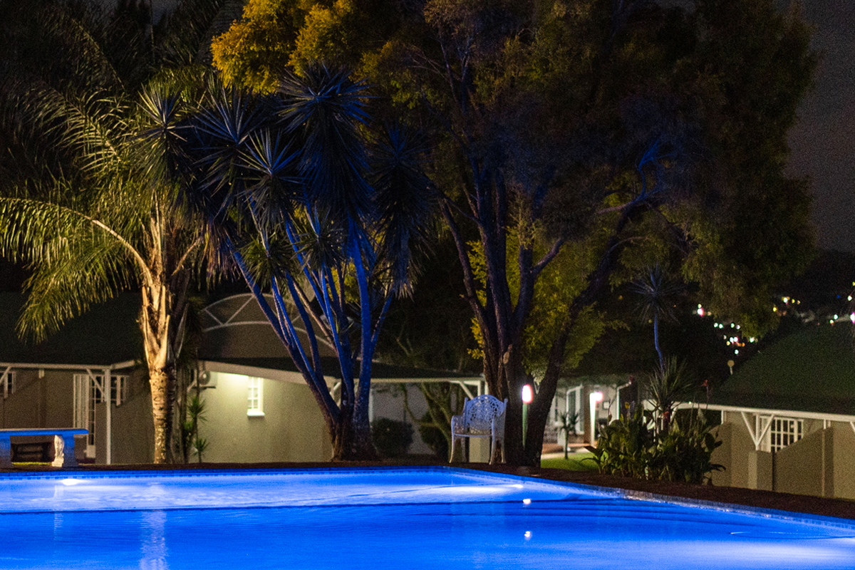 Swimming pool lit up at night
