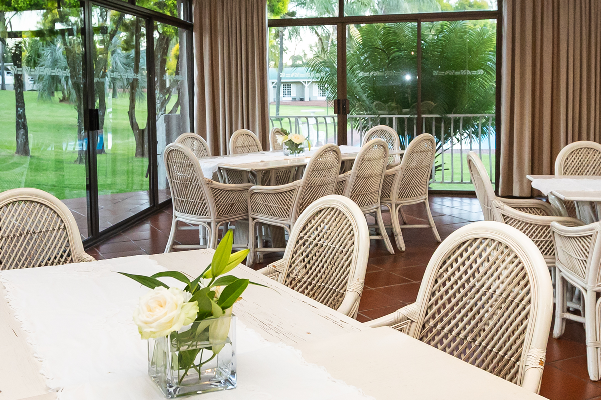 Bright dining room overlooking the lodge gardens