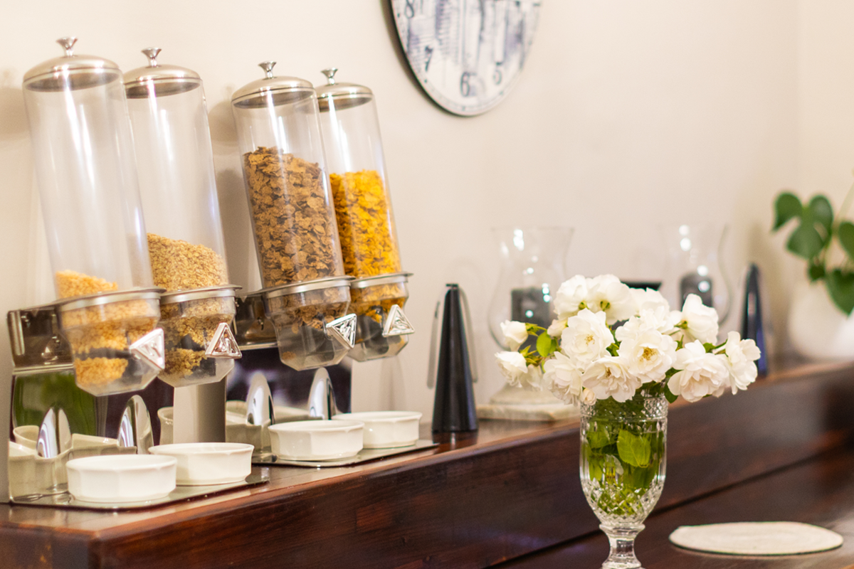 Breakfast cereal station with fresh flowers