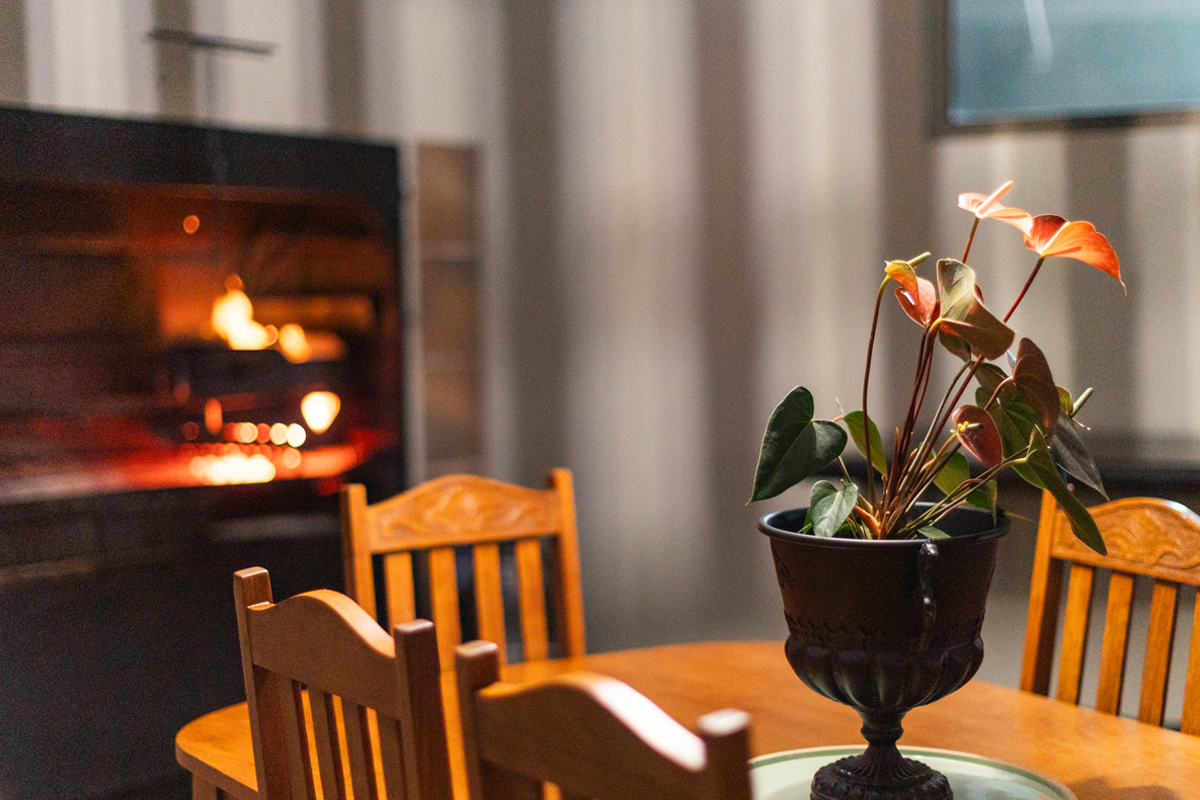 Dining table beside the fireplace